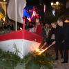 La princesse Charlene et le prince Albert II de Monaco ont enflammé ensemble la barque symbolique des célébrations de la Sainte Dévote, le 26 janvier 2014 en principauté.