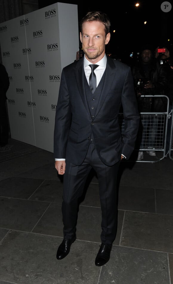 Jenson Button arrive à la National Portrait Gallery pour assister au vernissage de l'exposition Bailey's Stardust du photographe David Bailey. Londres, le 3 février 2014.