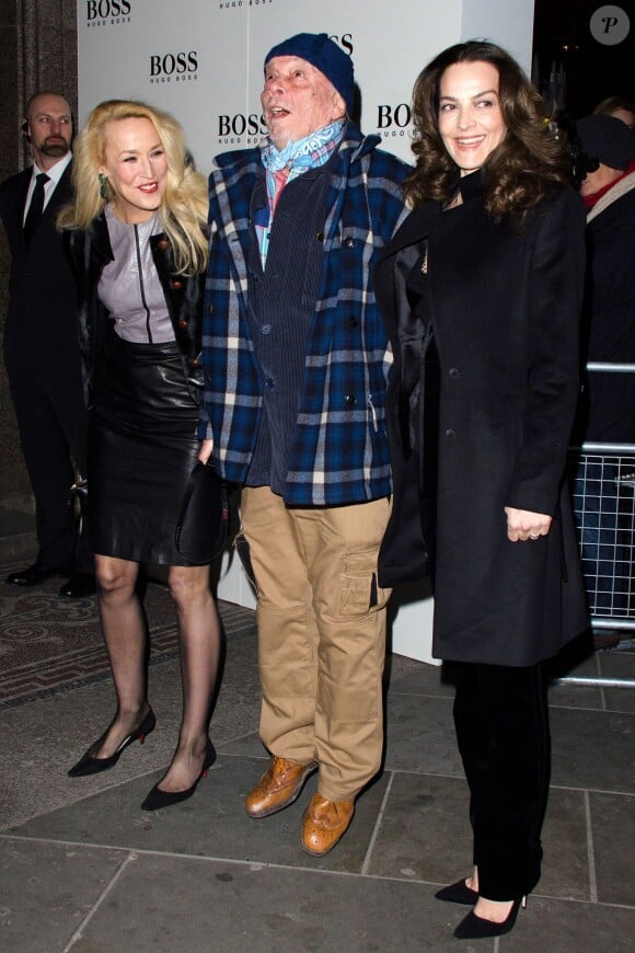 Jerry Hall, David Bailey et sa femme Catherine arrivent à la National Portrait Gallery pour le vernissage de l'exposition du photographe. Londres, le 3 février 2014.