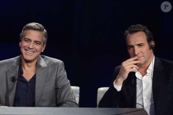 George Clooney, Jean Dujardin sur le plateau de l'émission Che Tempo Che Fa à Milan, le 9 février 2014.