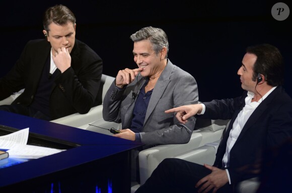 Matt Damon, George Clooney, Jean Dujardin sur le plateau de l'émission Che Tempo Che Fa à Milan, le 9 février 2014.