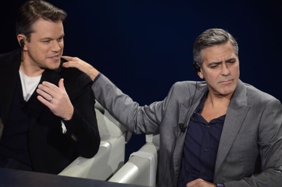 Matt Damon, George Clooney sur le plateau de l'émission Che Tempo Che Fa à Milan, le 9 février 2014.