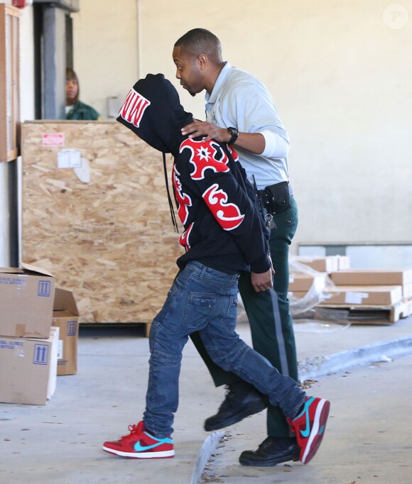 Exclusif -  Khalil Sharieff, l'acolyte de Justin Bieber, arrive au commissariat à Miami, le 23 janvier 2014.