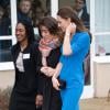 La duchesse Catherine de Cambridge arrive au lycée de Northolt, le 14 février 2014 dans l'ouest de Londres, pour l'inauguration officielle d'un nouveau site de l'association The Art Room, dont elle est la marraine.