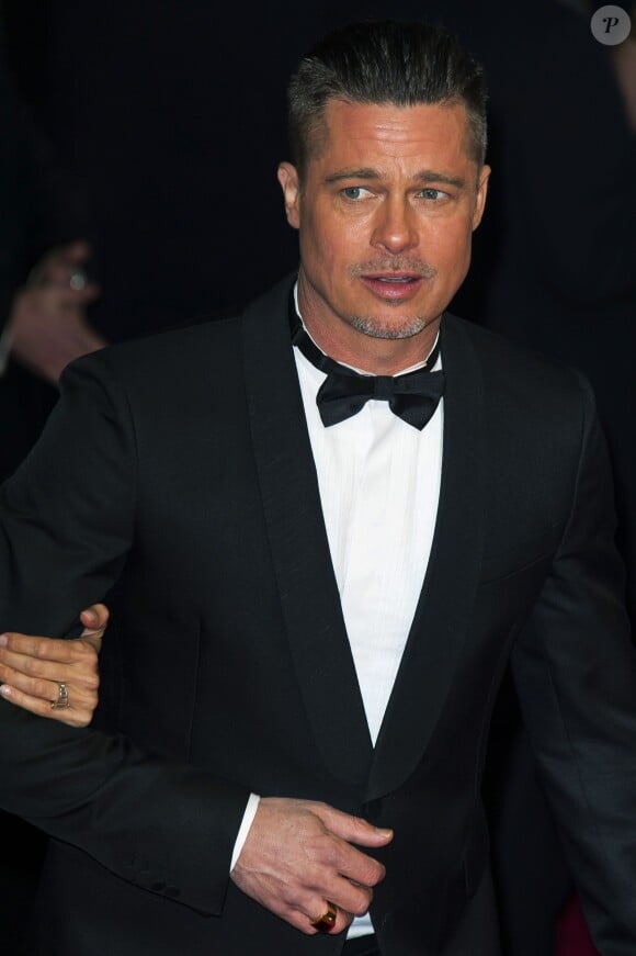 Brad Pitt sur le tapis rouge des BAFTA 2014 à Londres, le 16 février 2014.