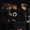 Les One Direction recevant un de leurs deux prix lors des Brit Awards 2014, le 19 février 2014 à Londres