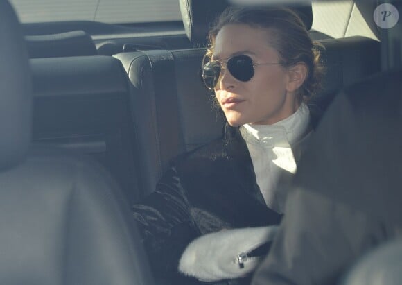 Mary-Kate Olsen arrive au défilé de mode, collection prêt-à-porter automne-hiver 2014/2015, à Louis Vuitton, Paris, le 5 mars 2014.