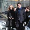 Natalia Viodanova enceinte et son compagnon au défilé Louis Vuitton à Paris, le 5 mars 2014.