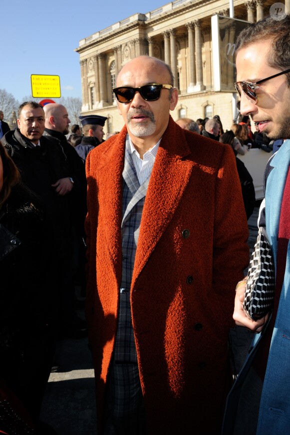 Christian Louboutin au défilé Louis Vuitton à Paris, le 5 mars 2014.
