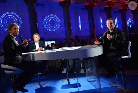 Michel Drucker et Francis Huster - Soirée de la chaîne I24News au Pavillon Cambon à Paris, le 12 mars 2014.