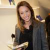 Laura Smet, fan de mode (et visiblement de chaussures !), assiste à l'inauguration de la nouvelle boutique Cosmoparis, sur la rue Saint Honoré. Paris, le 13 mars 2014.