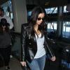 Kim, Kourtney et Khloe Kardashian arrivent à Los Angeles en provenance de Miami, le 13 mars 2014.