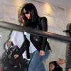 Kim, Khloe et Kourtney Kardashian arrivent à Los Angeles en provenance de Miami, le 13 mars 2014.