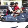 Tyga, sa compagne Blac Chyna et leur fils King Cairo, en balade à The Commons, tombent sur Scott Disick et sa Lamborghini. Calabasas, Los Angeles, le 16 mars 2014.