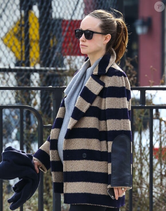Olivia Wilde, enceinte, rentre chez elle après une séance de gym à New York, le 12 mars 2014.