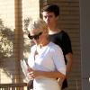 Pamela Anderson va faire du shopping avec ses enfants Brandon et Dylan Lee chez Barneys New York à Beverly Hills, le 5 fevrier 2014.