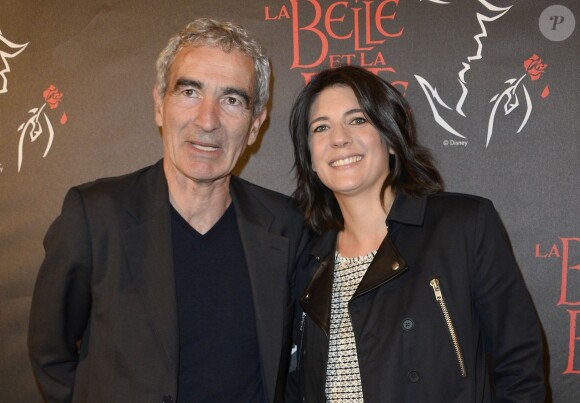 Raymond Domenech et sa compagne Estelle Denis - Première de la comédie musicale "La Belle et la Bête" avec Vincent Niclo dans le rôle de la Bête au théâtre Mogador à Paris le 20 mars 2014.
