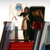 Michelle Obama arrive à Pékin avec sa mère Marian Robinson et ses filles Sasha et Malia, le 20 mars 2014.