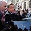 Nicolas Sarkozy et sa femme Carla Bruni sont allés voter aux alentours de 13 heures dans le 16e arrondissement de Paris à l'occasion des élections municipales, le 23 mars 2014.