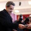 Nicolas Sarkozy et sa femme Carla Bruni sont allés voter vers 13 heures dans le 16e arrondissement de Paris à l'occasion des élections municipales, le 23 mars 2014.