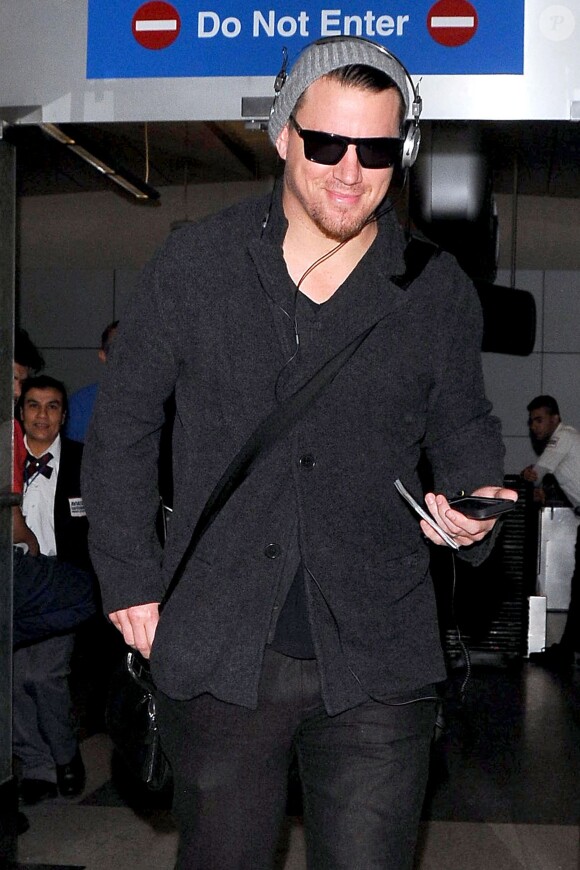 Channing Tatum arrive au LAX de Los Angeles, le 18 mars 2014.