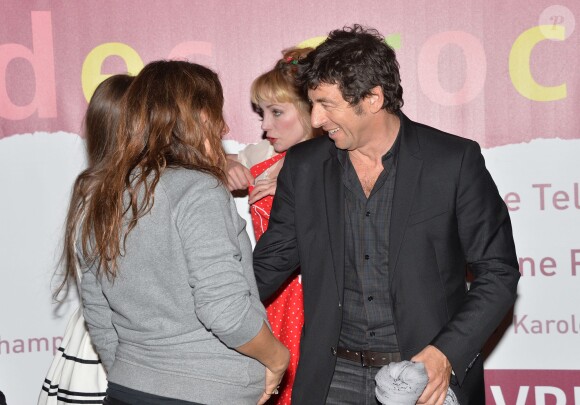 Karole Rocher (enceinte) et Patrick Bruel à l'avant-première du film "Les Yeux Jaunes Des Crocodiles" au cinéma Gaumont Marignan à Paris, le 31 mars 2014.