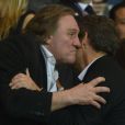  Gérard Depardieu embrasse Nicolas Sarkozy - Au Parc des Princes pour le match PSG-Chelsea en quart de final de la Ligue des Champions, à Paris le 2 avril 2014. 