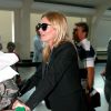 Kate Moss et sa fille Lila arrivent à Sao Paulo le 4 avril 2014, pour assister au gala de l'amfAR.