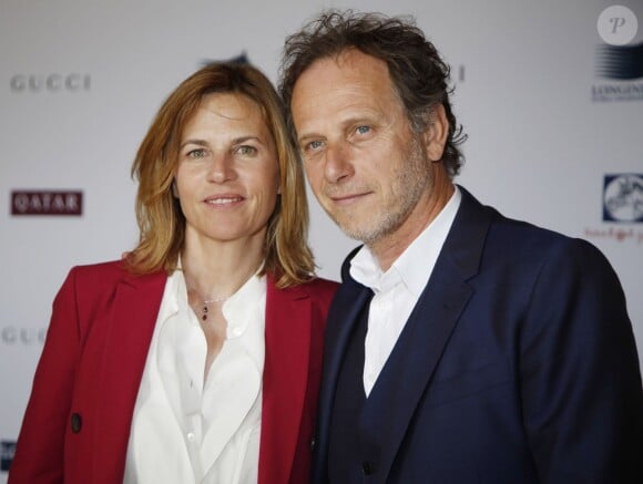 Virginie Coupérie-Eiffel et son compagnon Charles Berling lors de la présentation de la 1re édition du Paris Eiffel Jumping, le 8 avril 2014 à l'Hôtel de Ville de Paris.