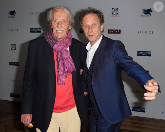Jean Rochefort et Charles Berling lors de la présentation de la 1re édition du Paris Eiffel Jumping, le 8 avril 2014 à l'Hôtel de Ville de Paris.