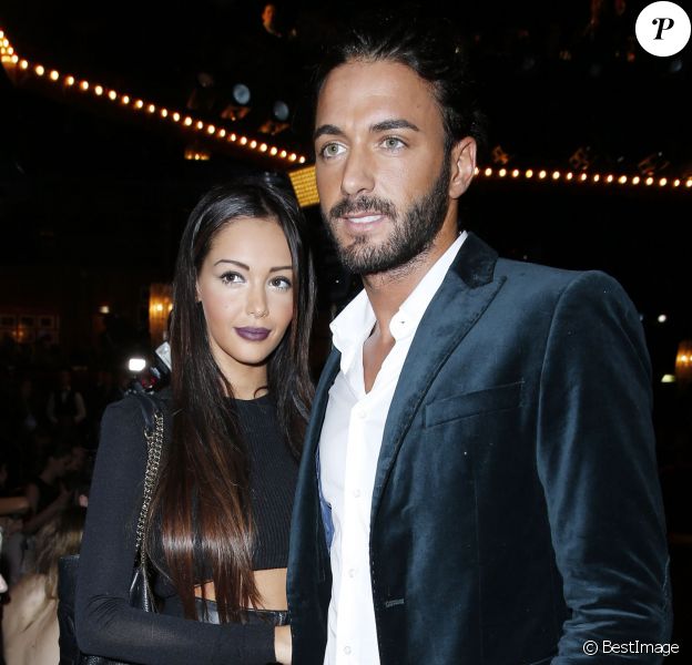 Nabilla Benattia et Thomas lors du défilé de mode Jean Paul Gaultier, collection prêt-a-porter printemps-éte 2014, au Paradis Latin à Paris, le 28 septembre 2013, durant la Fashion Week