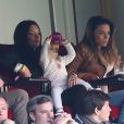 Emilie Nef Naf avec sa fille Maëlla assistent au match de football PSG contre Reims au Parc des Princes en compagnie de Capucine Anav à Paris le 5 avril 2014.