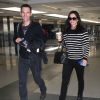 Exclusif - Courteney Cox et son petit ami Johnny McDaid à l'aéroport de LAX à Los Angeles. Le 20 avril 2014.