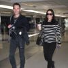 Exclusif - Courteney Cox et son boyfriend Johnny McDaid à l'aéroport de LAX à Los Angeles, le 20 avril 2014.