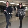 Exclusif - Courteney Cox et son petit ami Johnny McDaid à l'aéroport de LAX à Los Angeles. Le 20 avril 2014.