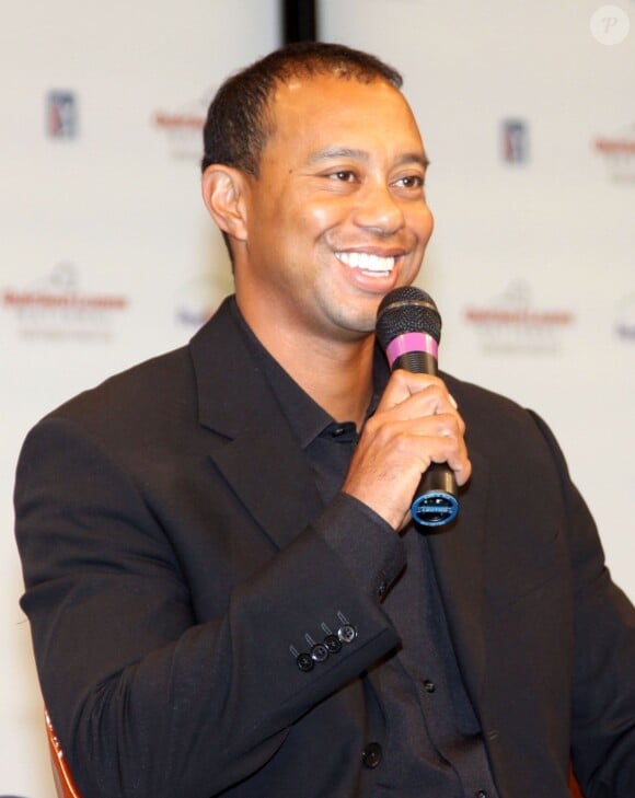 Tiger Woods donne une conférence de presse lors du tournoi de golf "Quicken Loans National" à Washington, le 24 mars 2014