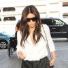 Kim Kardashian arrive à l'aéroport LAX de Los Angeles pour prendre un avion à destination de Paris. Le 29 avril 2014.