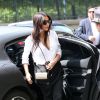 Kim Kardashian arrive à l'hôtel Le Meurice, à bord du véhicule Porsche noir mat de son fiancé Kanye West. Le 30 avril 2014.