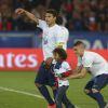 Thiago Silva, son fils et Marco Verratti après le match entre le PSG et Rennes, qui fait du club de la capitale le champion de France 2014 malgré la défaite, le 7 mai 2014 au Parc des Princes à Paris