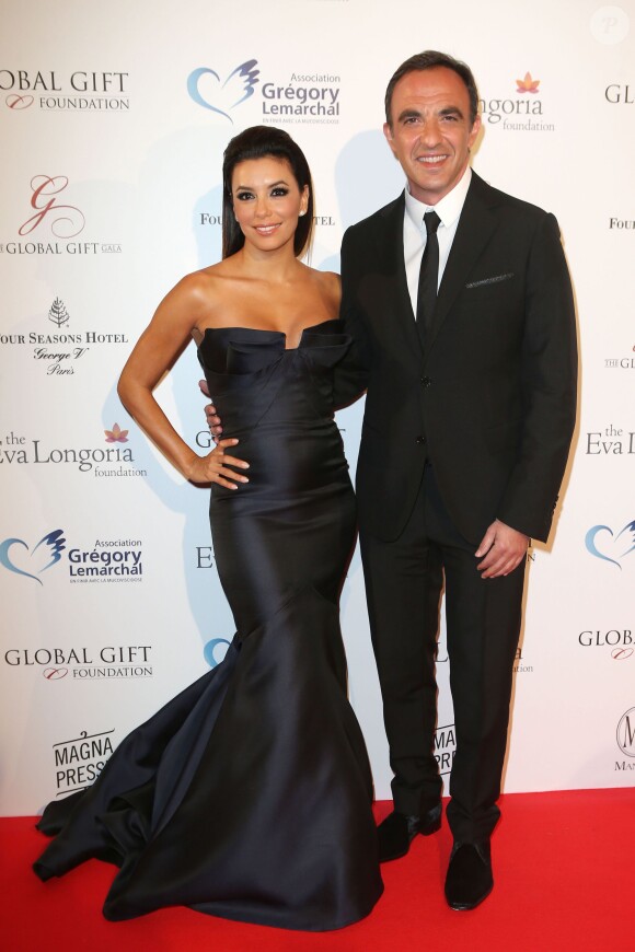 Eva Longoria et Nikos Aliagas - Soirée "Global Gift Gala 2014 " à l'hôtel Four Seasons George V à Paris le 12 mai 2014.