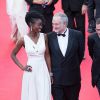 Aïssa Maïga et Jacques Attali - Montée des marches du film "Mr. Turner" lors du 67 ème Festival du film de Cannes le 15 mai 2014