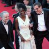 Jacques Attali et Aïssa Maïga - Montée des marches du film "Mr. Turner" lors du 67 ème Festival du film de Cannes le 15 mai 2014