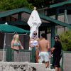 Pamela Anderson et son mari Rick Salomon au bord de la piscine à l'Eden Roc hotel d'Antibes, le 16 mai 2014.