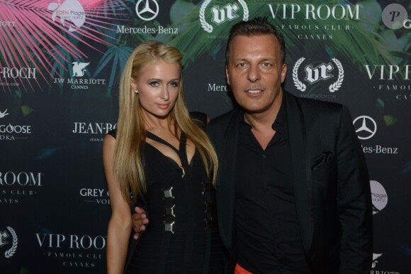 Paris Hilton et son ami Jean-Roch au VIP Room de Cannes, le jeudi 15 mai 2014.