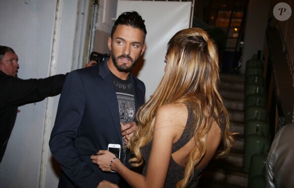 Nabilla Benattia et son petit ami Thomas Vergara croisent Paris Hilton à la sortie de la boite de nuit "Cosy Box" à Cannes, le 17 mai 2014.