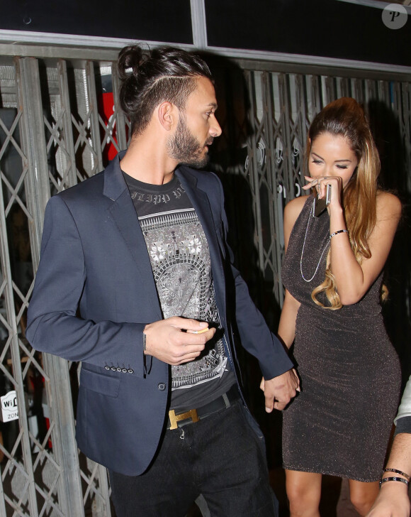 Nabilla Benattia et son petit ami Thomas Vergara croisent Paris Hilton à la sortie de la boite de nuit "Cosy Box" à Cannes, le 17 mai 2014.