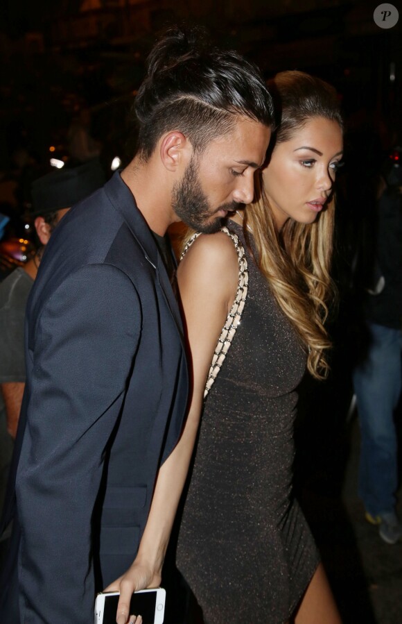 Nabilla Benattia et son petit ami Thomas Vergara croisent Paris Hilton à la sortie de la boite de nuit "Cosy Box" à Cannes, le 17 mai 2014.