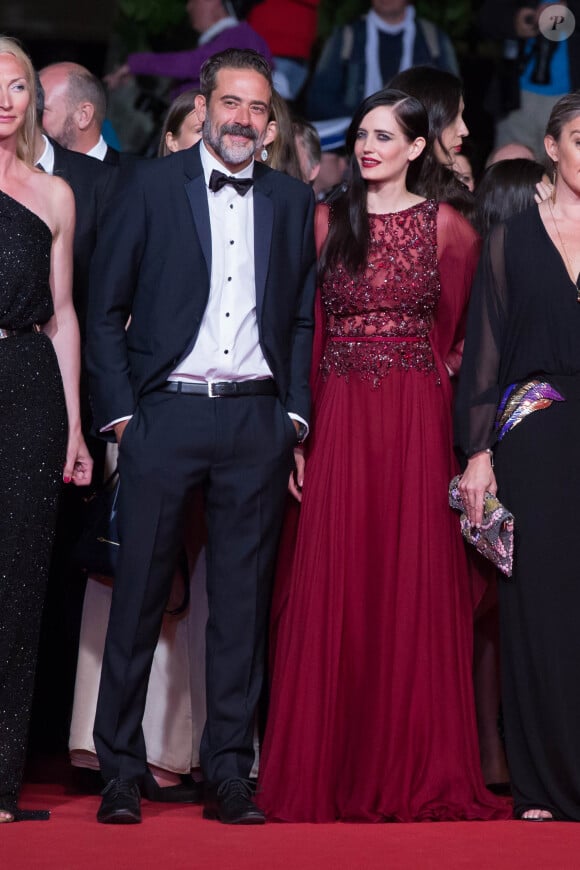 Jeffrey Dean Morgan et Eva Green (portant une robe Elie Saab) - Montée des marches du film "The Salvation" lors du 67e Festival du film de Cannes le 17 mai 2014