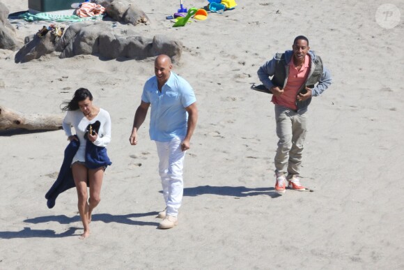 Vin Diesel, Ludacris, Jordana Brewster sur le tournage de Fast & Furious 7 à Malibu, Los Angeles, le 20 mai 2014.
