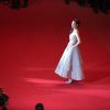 Marion Cotillard (robe Christian Dior) lors de la montée des marches du film L'homme qu'on aimait trop, 67e Festival de Cannes, le 21 mai 2014.